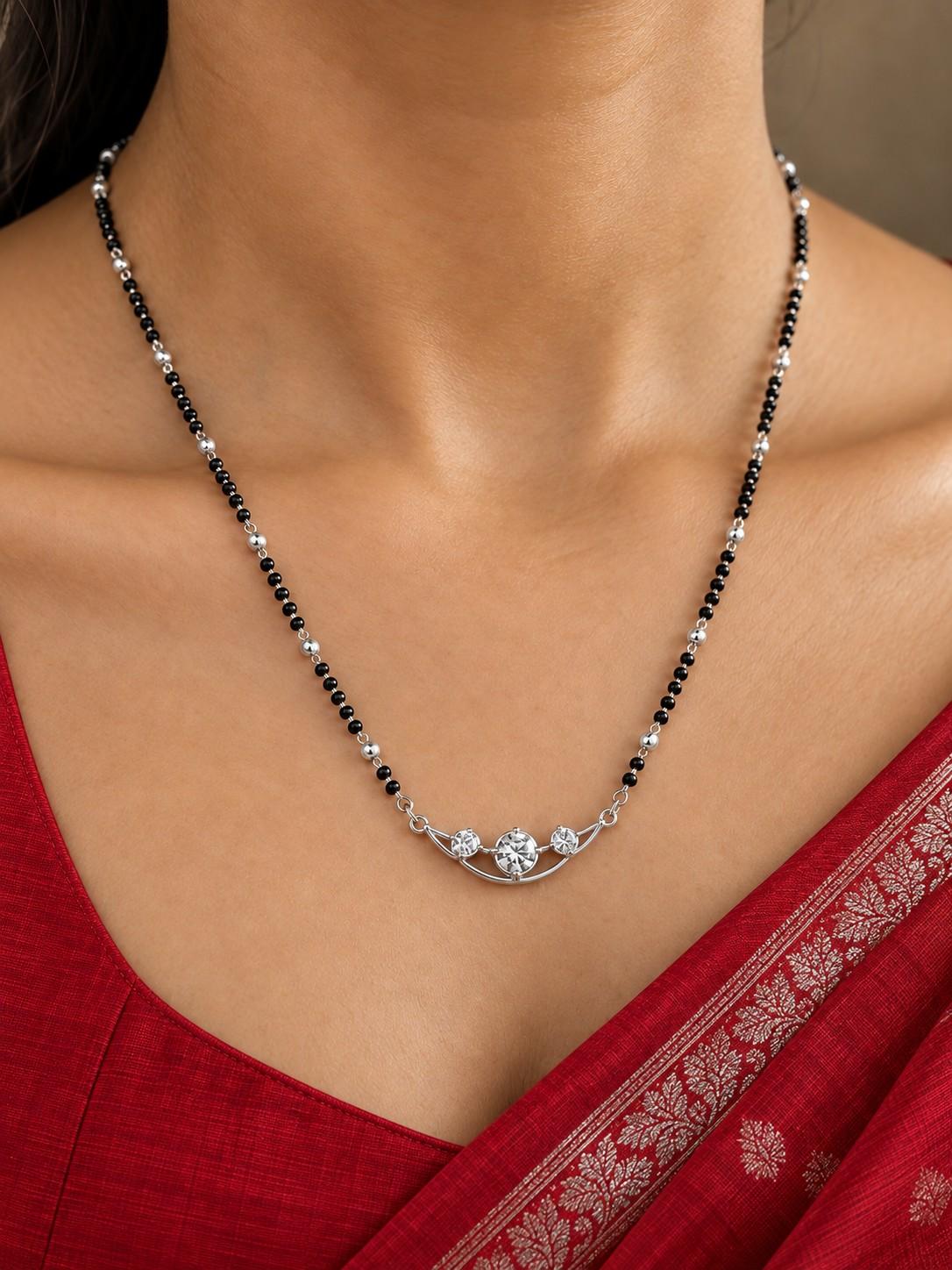 Silver-look mangalsutra with black beads and stone pendant